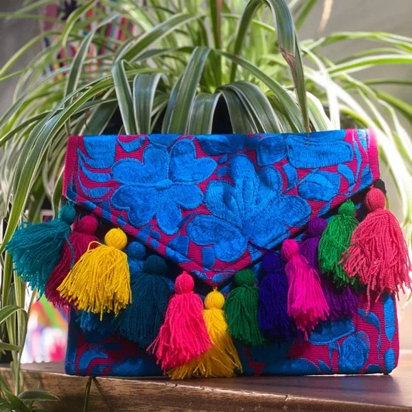 Tassled envelope clutch with zippered closure - Picture 2 of 11